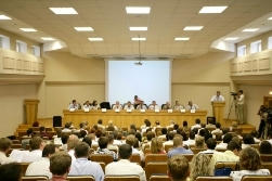 An audience observing a panel discussion